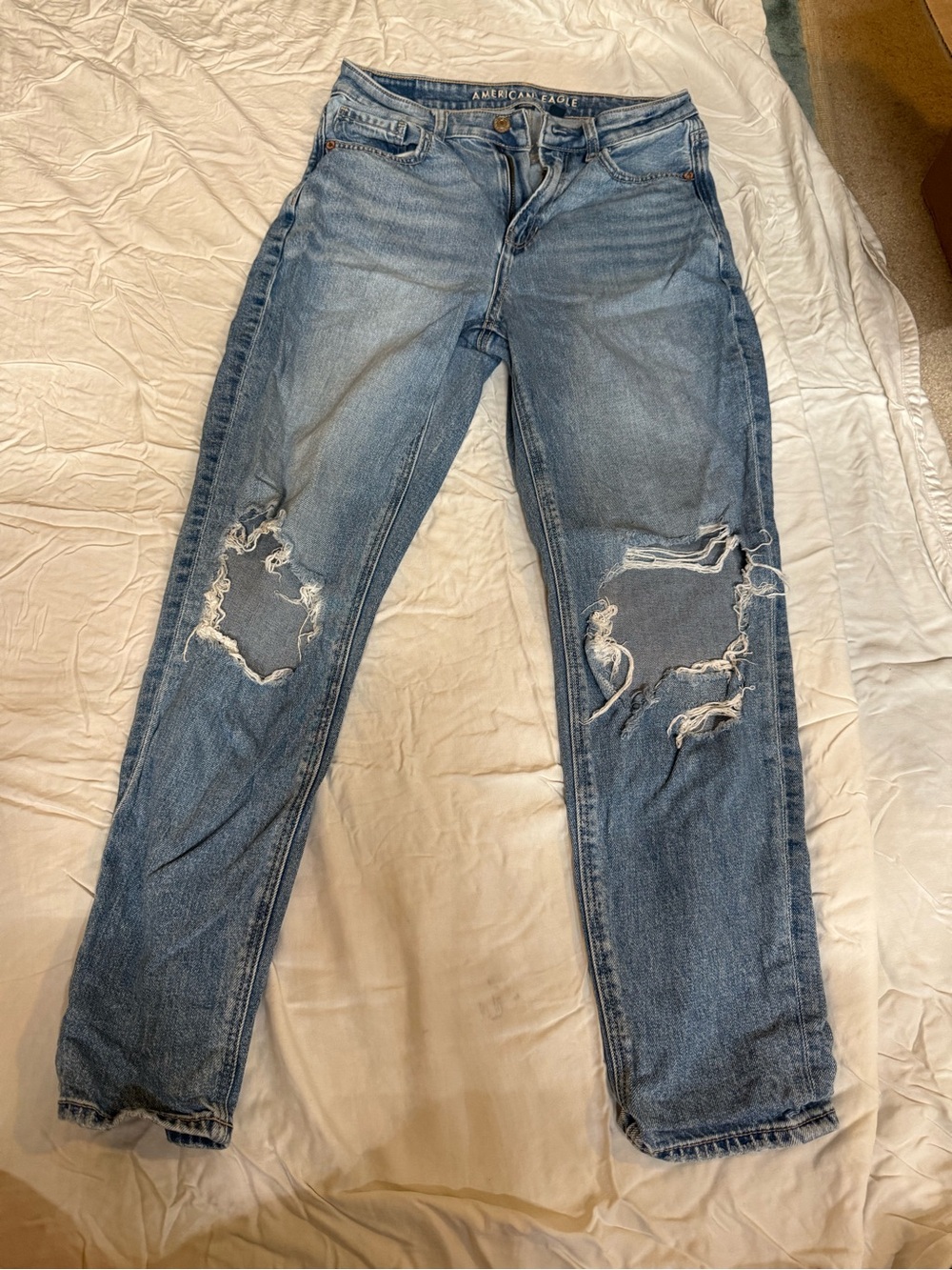 American Eagle Outfitters Light Blue High-Rise Distressed Jeans